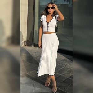 NWT Cute white skirt set with black trim.